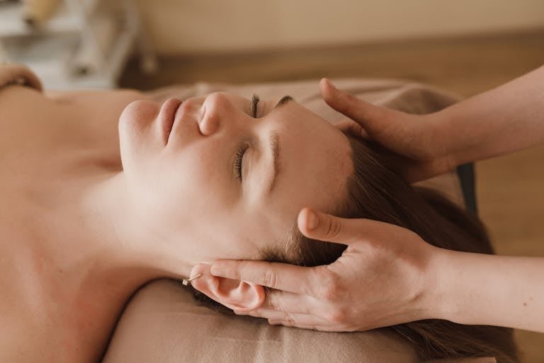 A calming spa facial massage focusing on healing hormonal imbalance